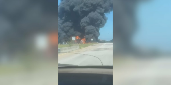 Crash in Lee county involves truck tractor towing barrels of crude oil